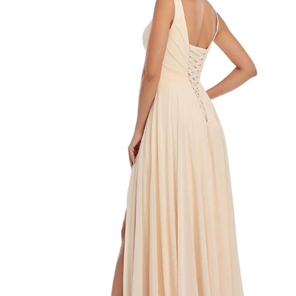 Rjer Formal Gown in Blush size 12.  The lace up back makes it very adjustable.